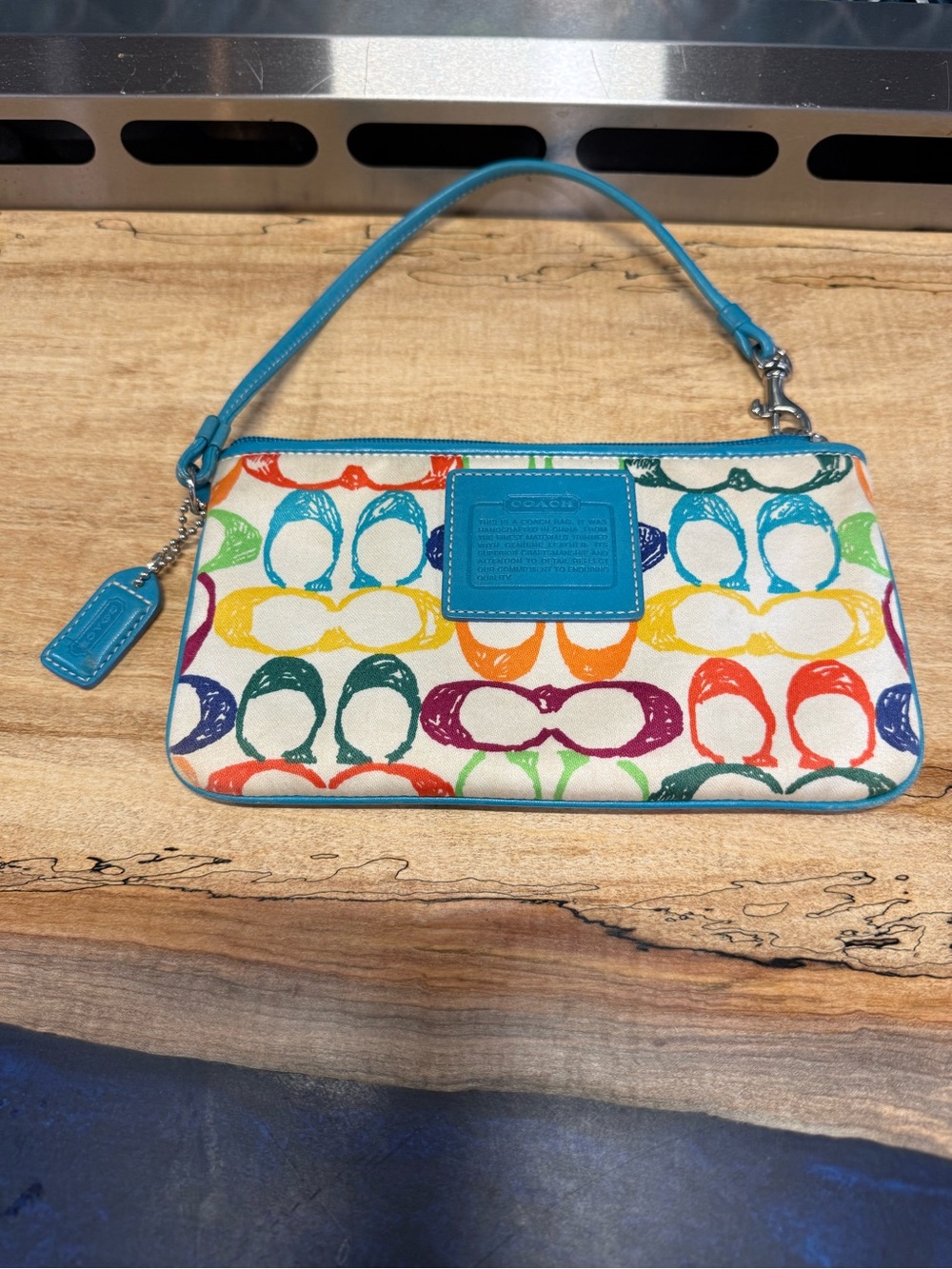 Coach Hampton Scribble Wristlet with Turquoise Trim